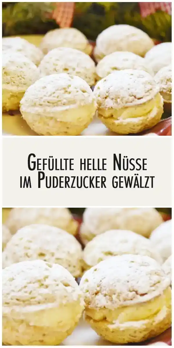 Gefüllte helle Nüsse im Puderzucker gewälzt 1 Gefüllte helle Nüsse im Puderzucker gewälzt